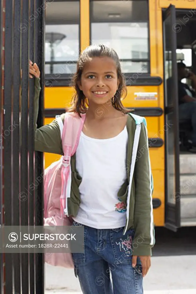Girl by School Bus   