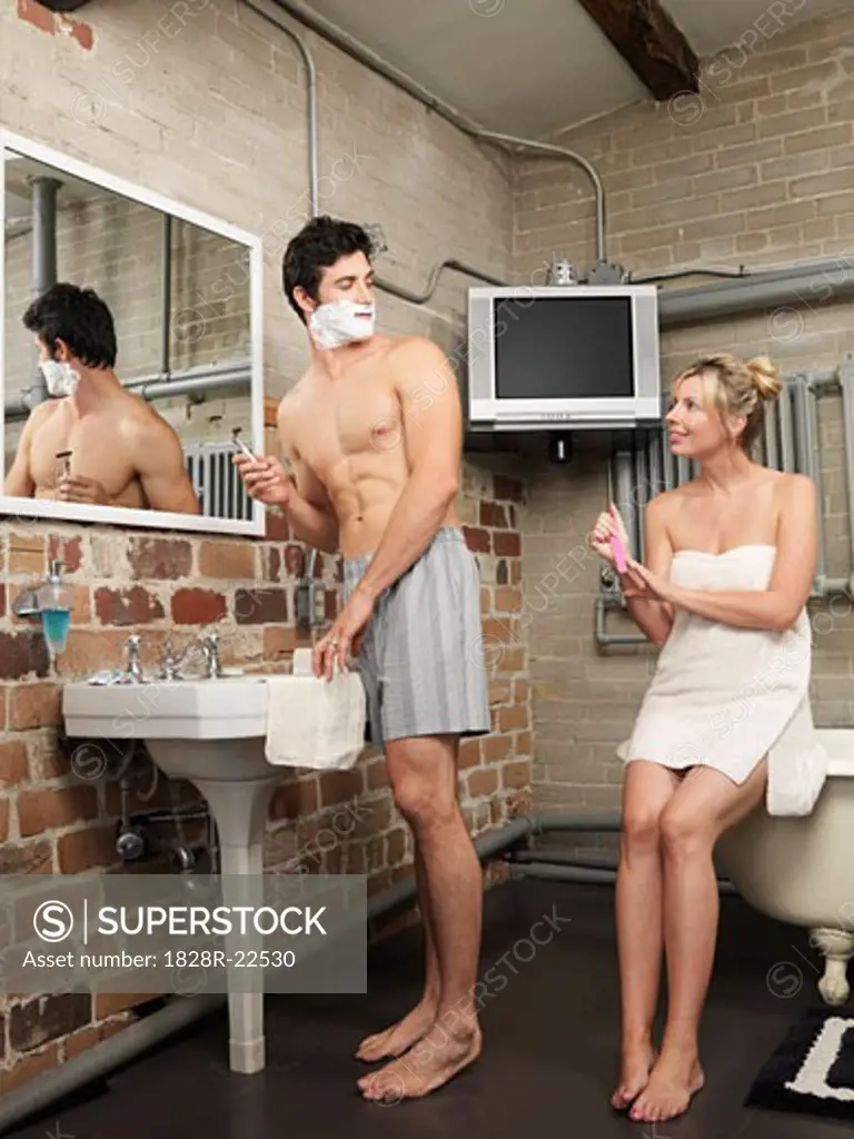 Woman Watching Man Shave   