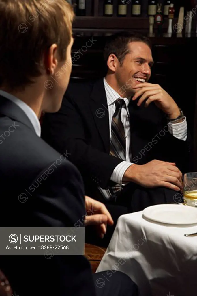 Men Talking Over Drinks   