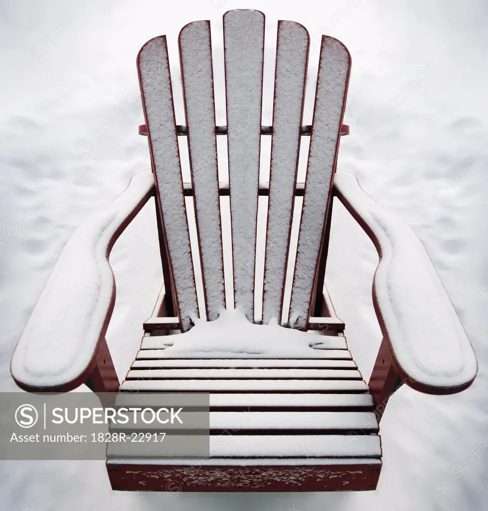 Snow Covered Adirondack Chair   