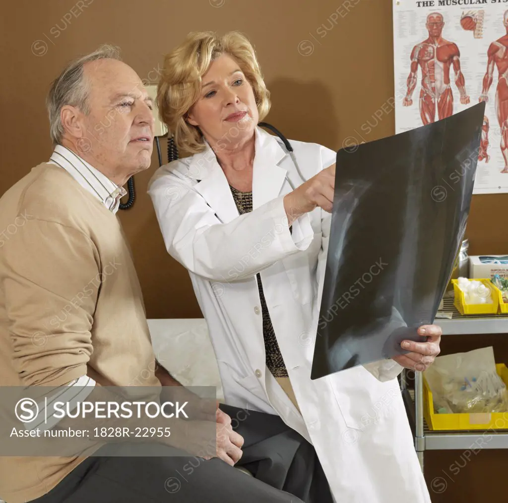 Doctor Showing Patient X-Ray   