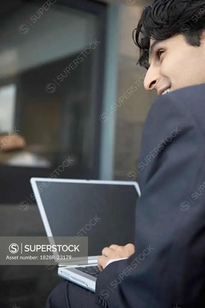 Businessman Using Laptop   