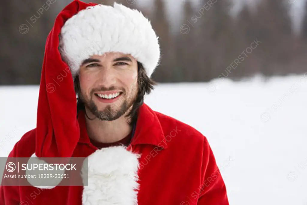 Man Wearing Santa Suit, Meadow Park, Whistler, British Columbia, Canada   