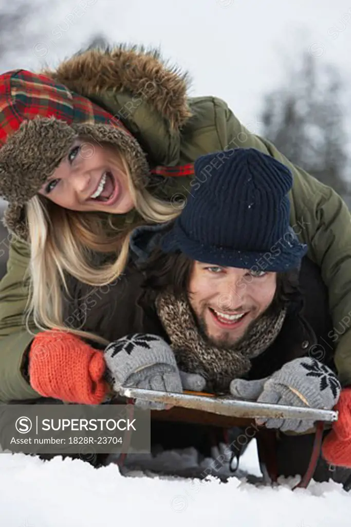 Portrait of Couple on Sled   