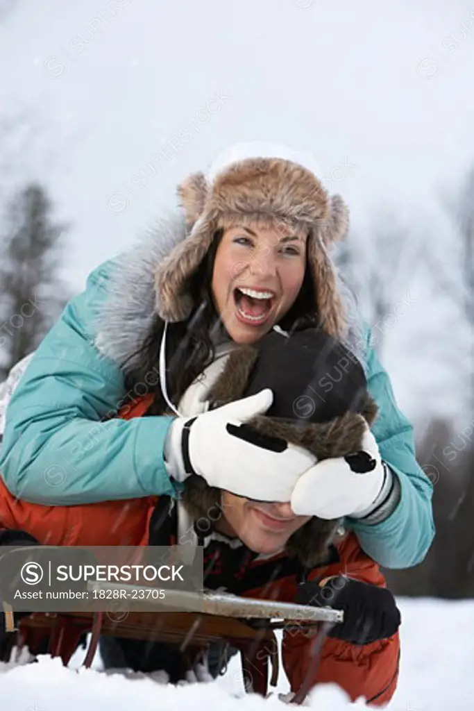 Portrait of Couple on Sled   