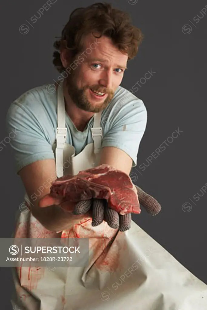 Portrait of Butcher with Meat   