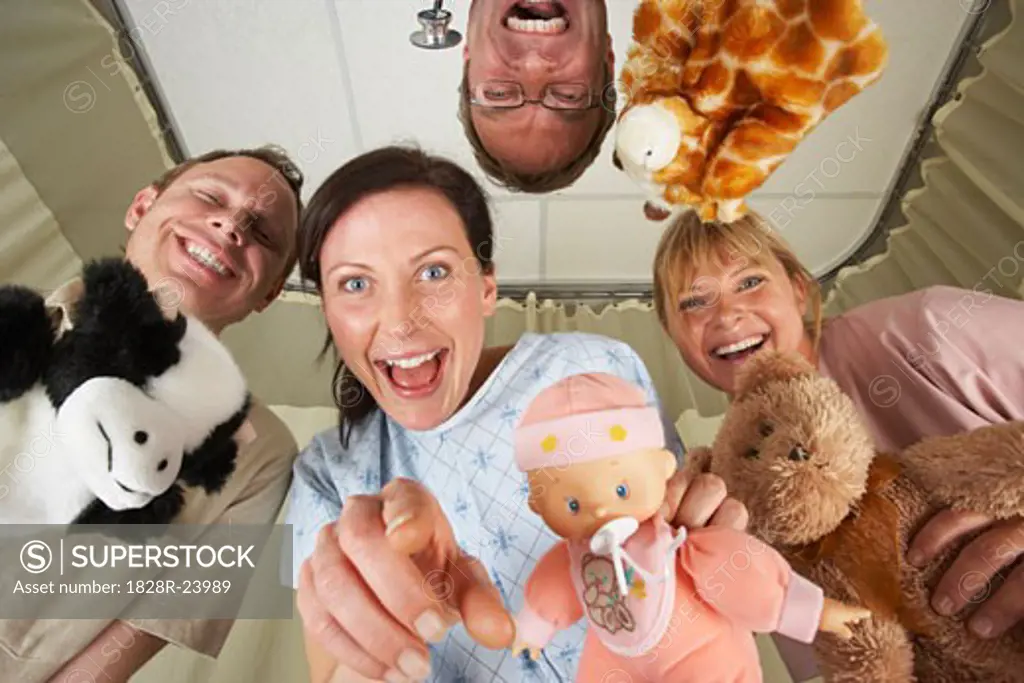 Parents, Doctor and Nurse with Toys   