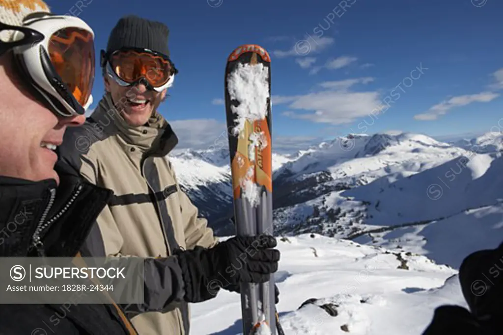 Two Men on Top of Ski Hill, Whislter, BC, Canada   
