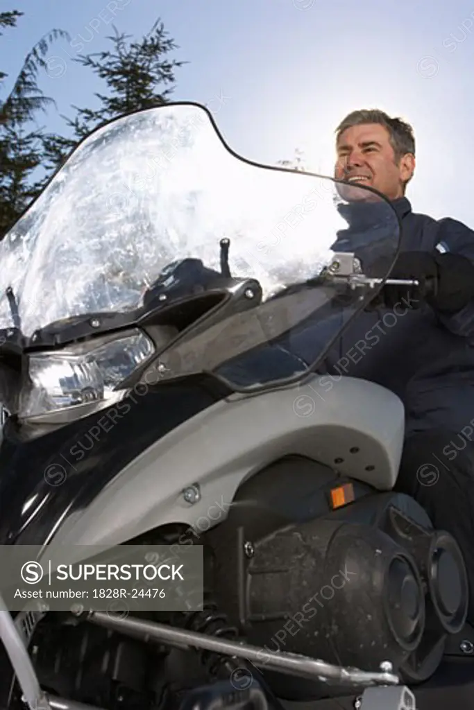 Man on Snowmobile   