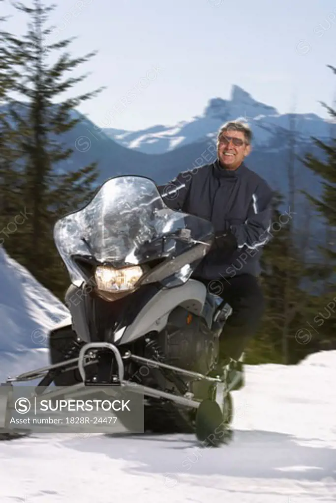 Man on Snowmobile   