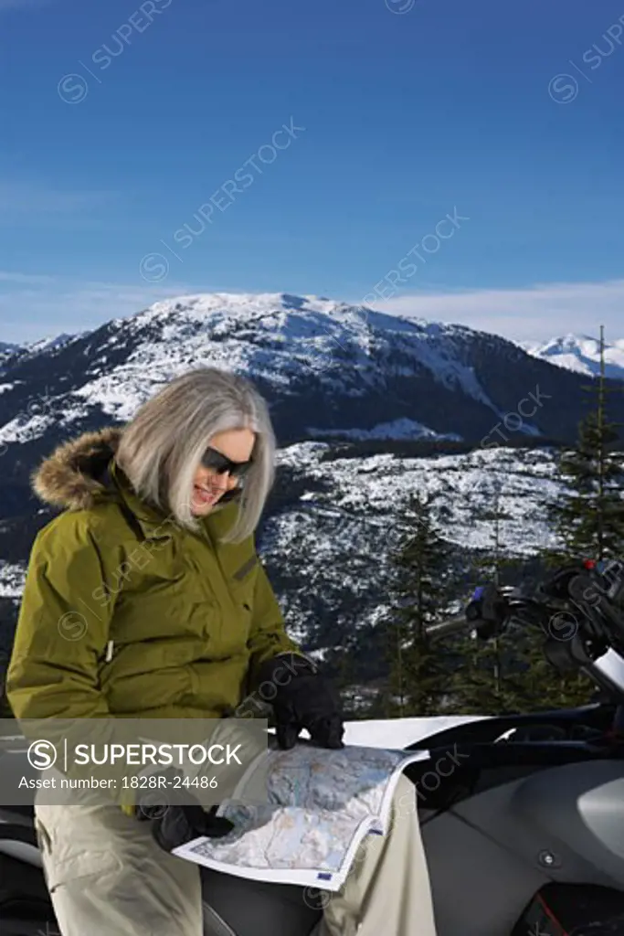 Woman with Snowmobile   