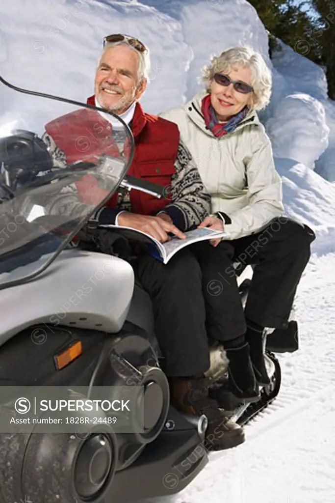 Couple with Snowmobile   