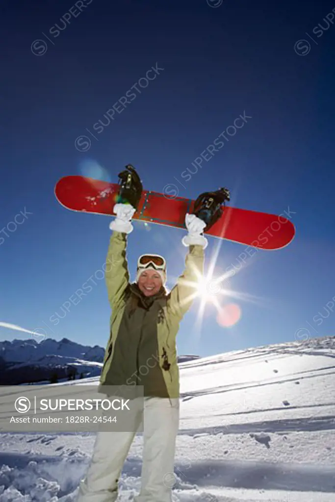 Woman Snowboarding   