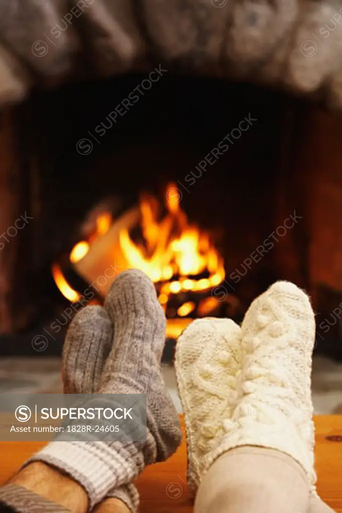 Feet in Front of Fireplace   