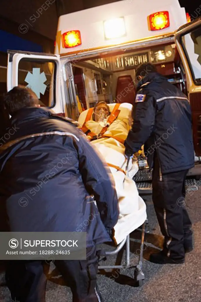 Paramedics Removing Patient From Ambulance   