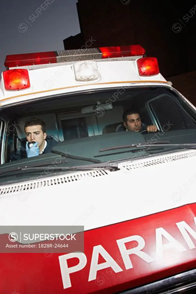 Paramedics Inside Ambulance   
