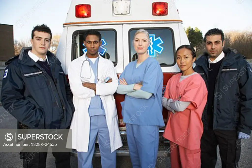 Medical Personnel Standing in Front of Ambulance   