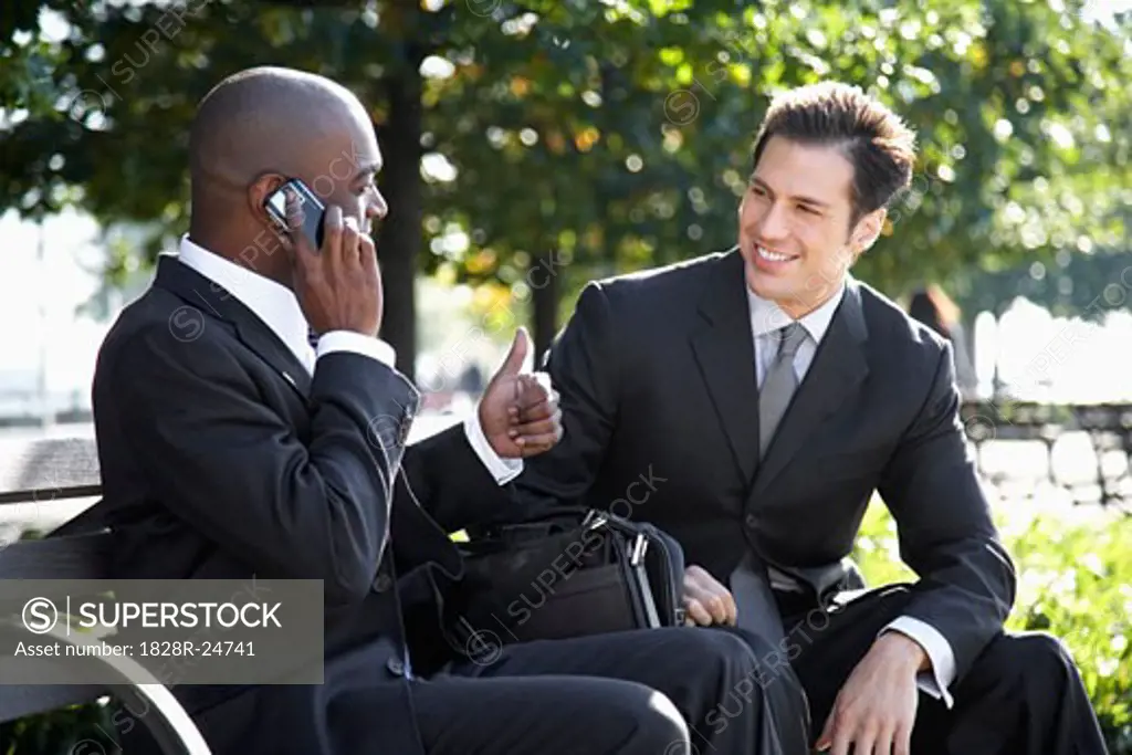 Businessmen Talking Outdoors   