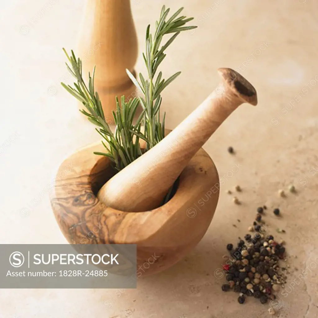 Rosemary in Mortar and Pestle with Pepper   