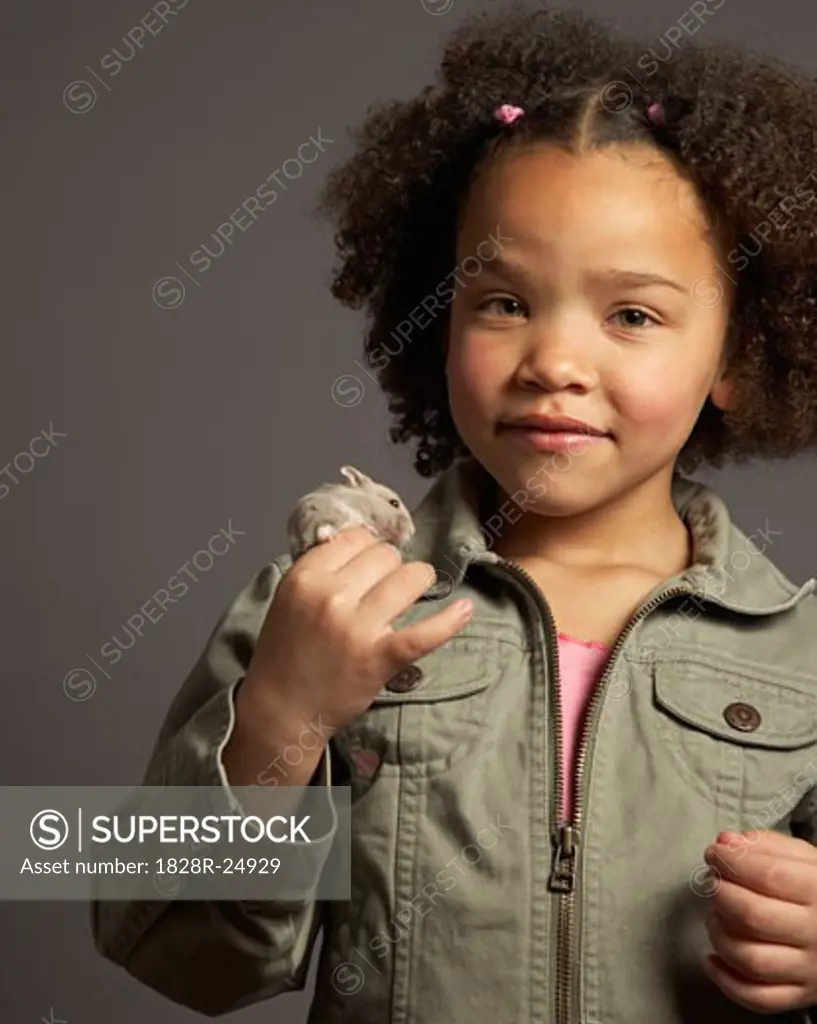 Girl Holding Hamster   