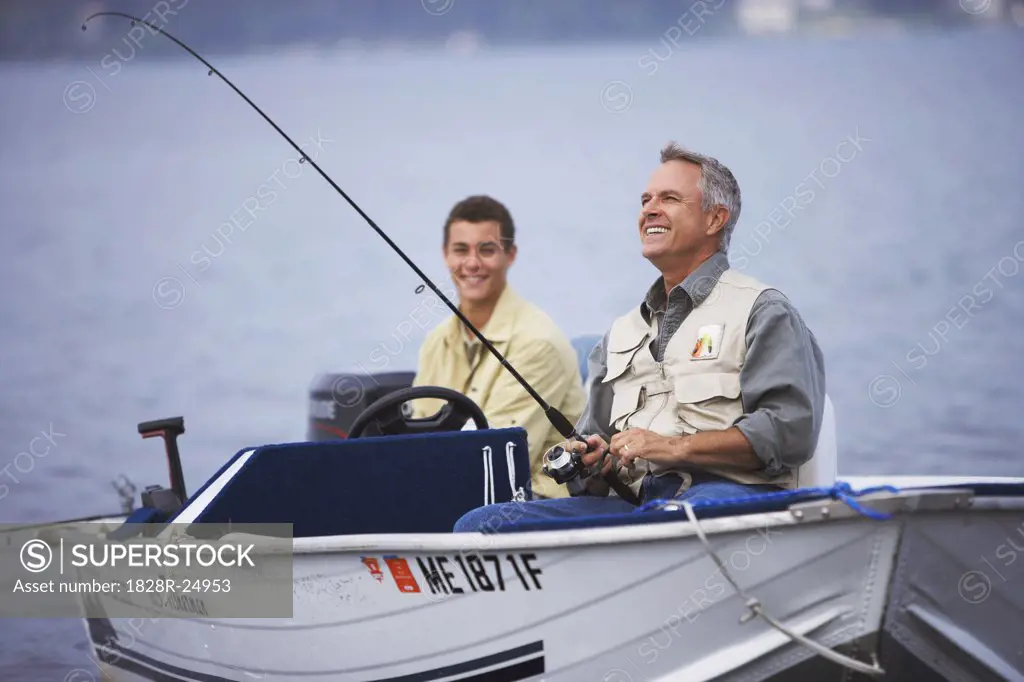 Man and Teenager Fishing, Belgrade Lakes, Maine, USA   
