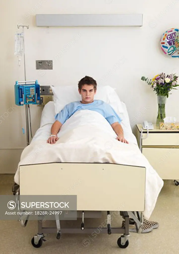 Boy in Hospital Bed   