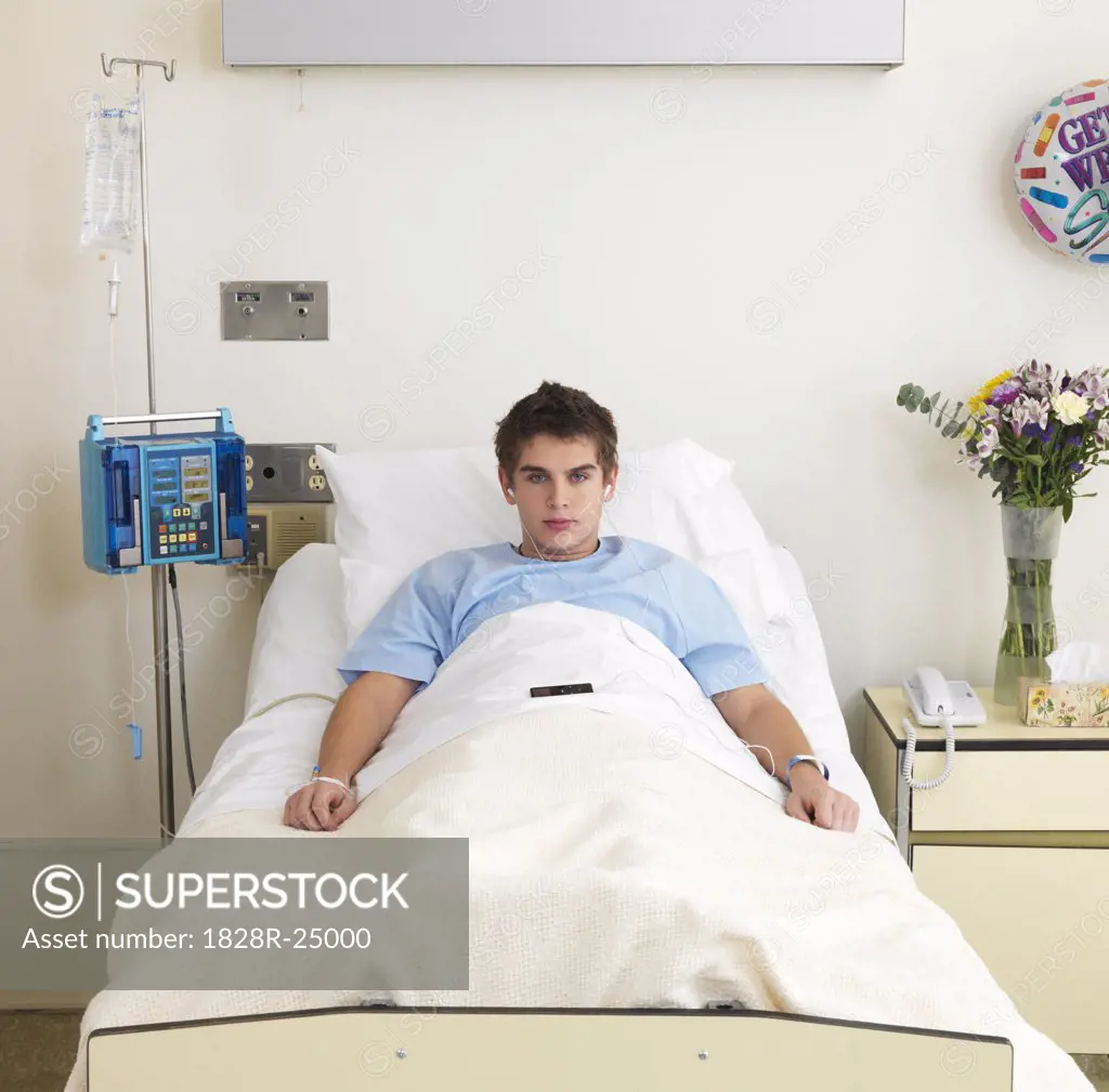 Boy in Hospital Bed   