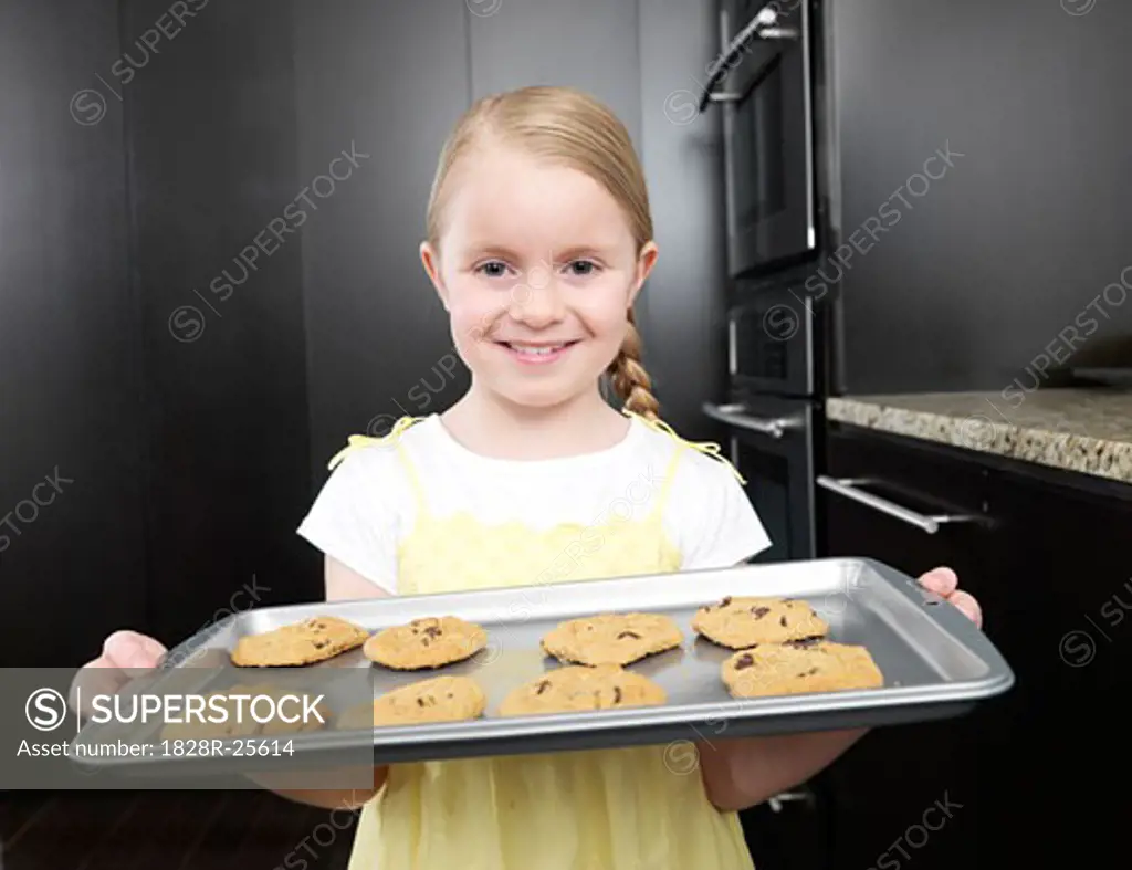Little Girl Holding Cookies   