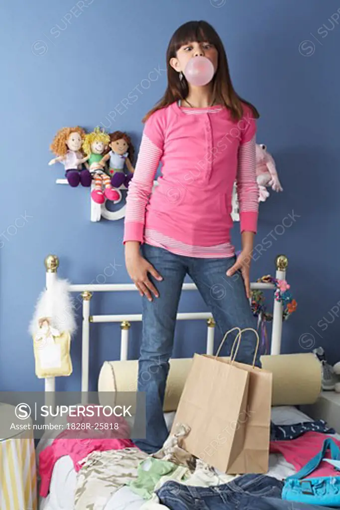 Girl Standing on Bed   