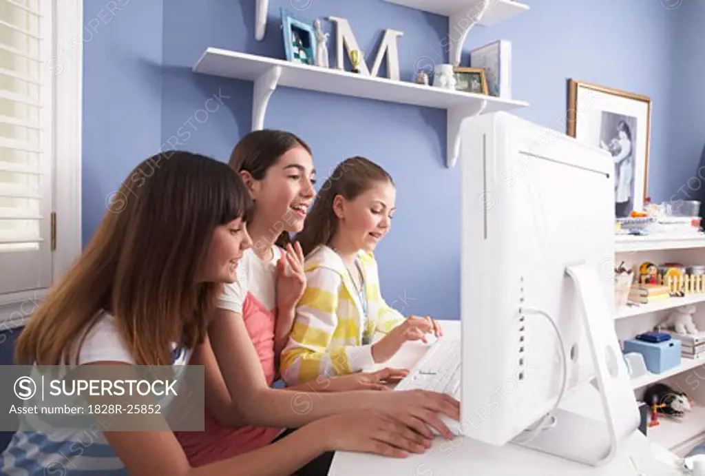 Girls Using Computer   