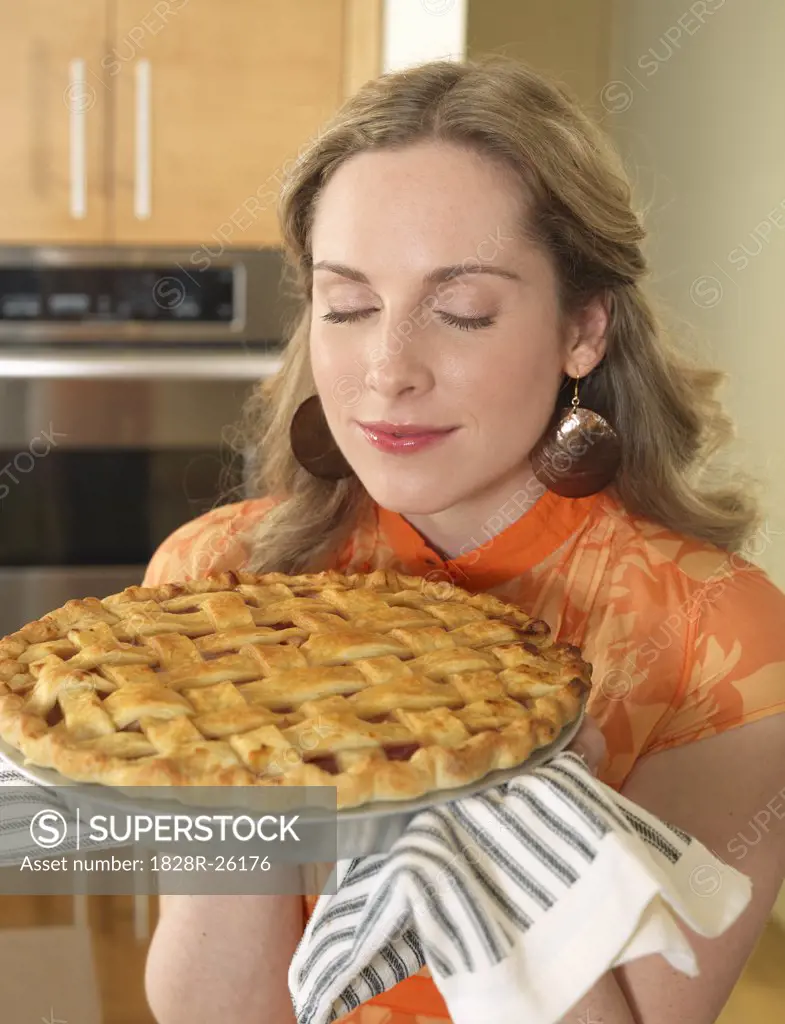 Portrait of Woman Smelling Pie   