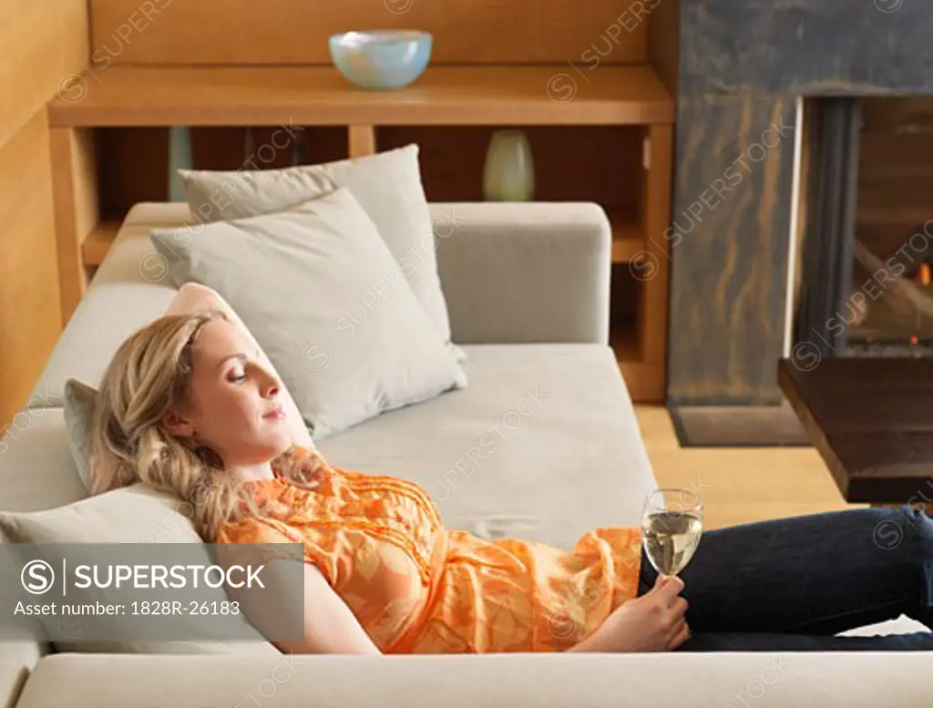 Woman Relaxing on Sofa   