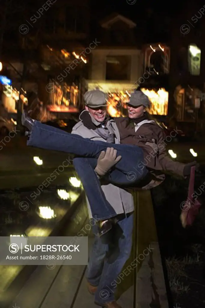 Man Carrying Woman   