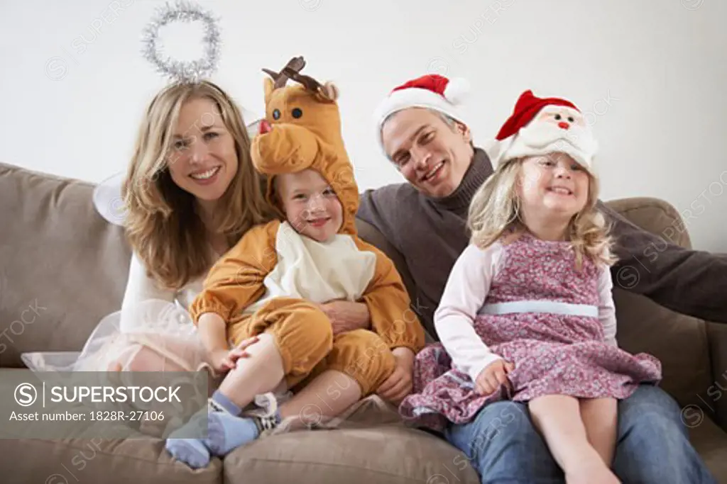 Portrait of Family Wearing Costumes   