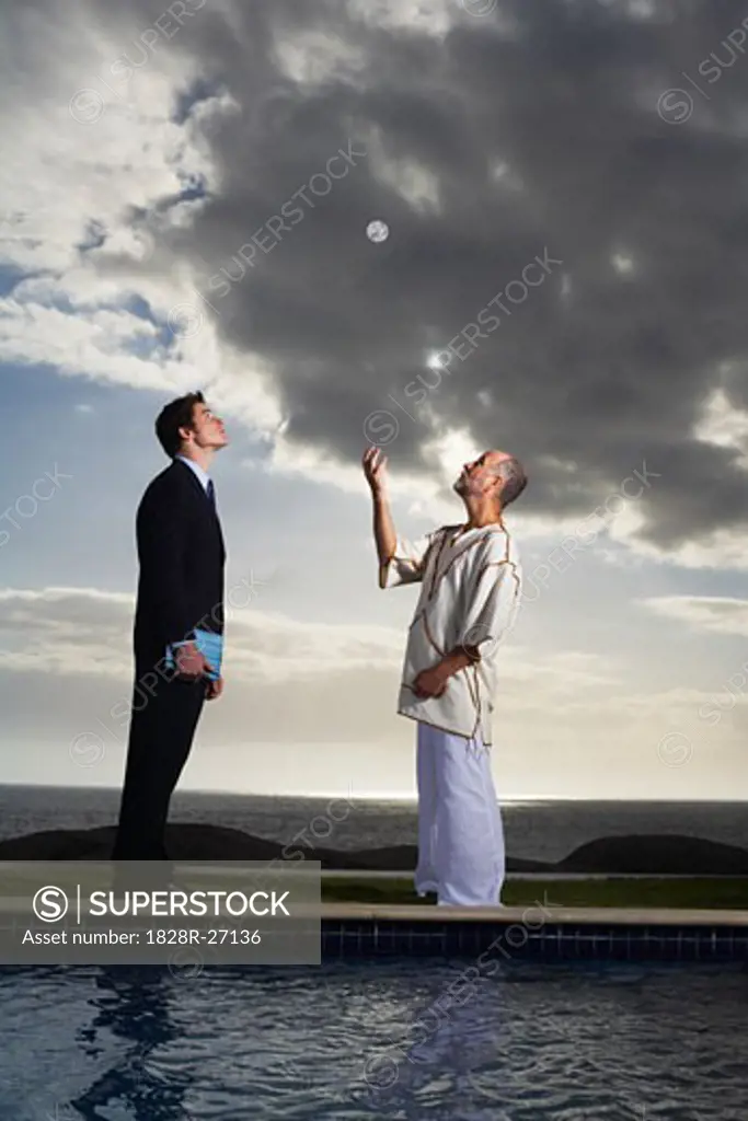 Men Looking at Sphere   