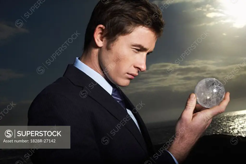 Man Looking at Sphere   