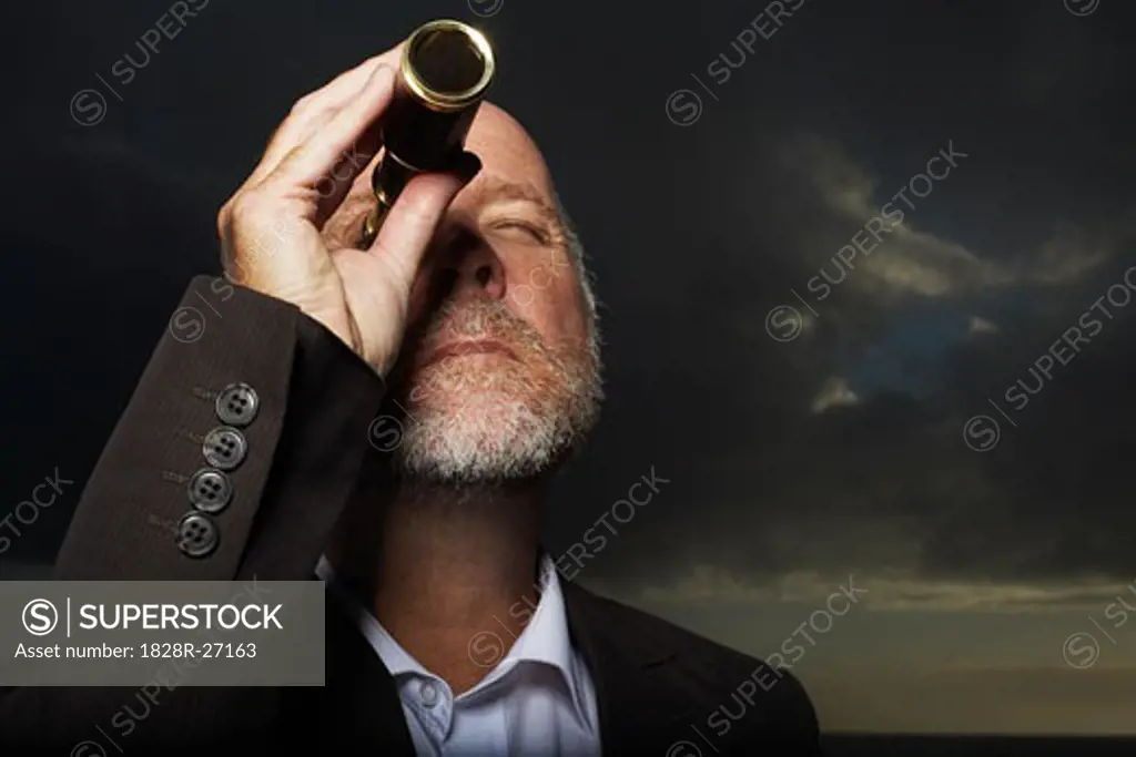 Man Looking Through Telescope   