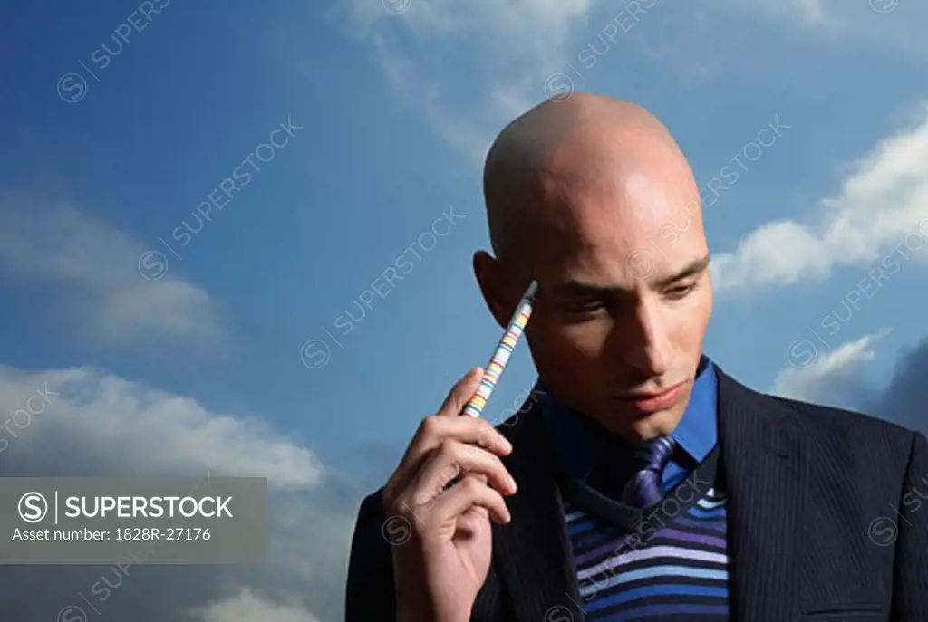 Businessman Thinking Outdoors   