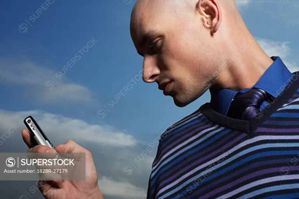 Man Using Cellular Telephone   
