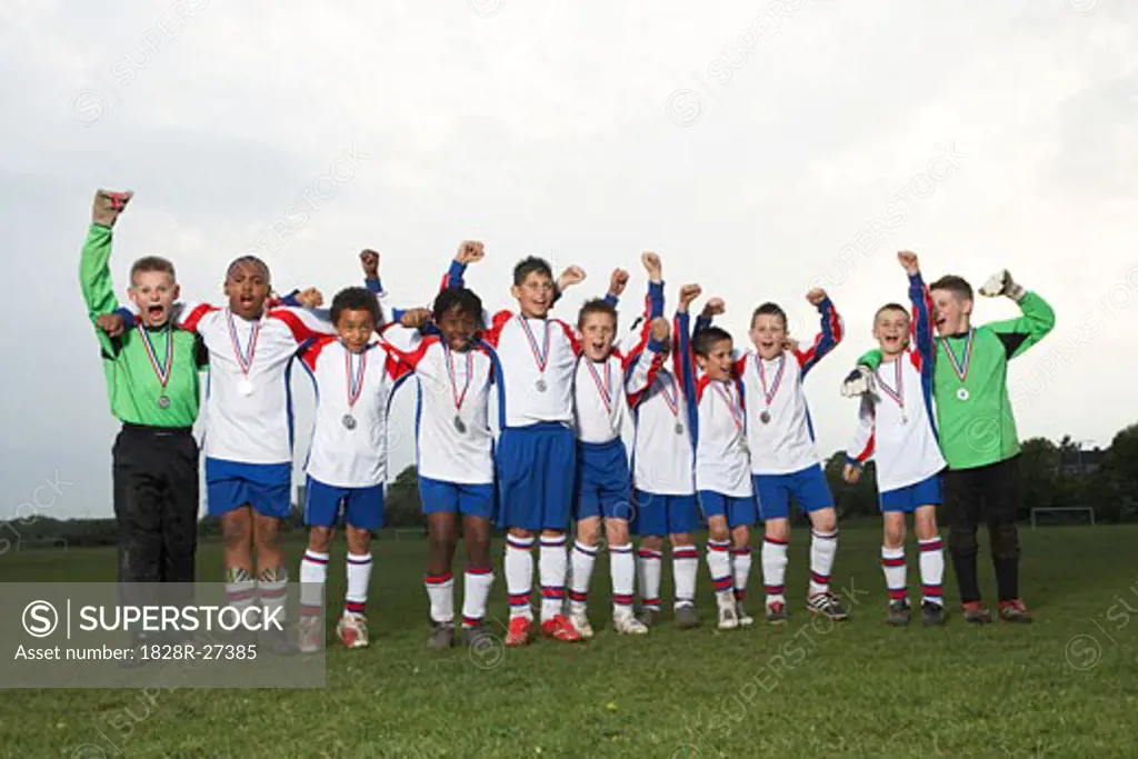 Portrait of Soccer Team With Gold Medals   