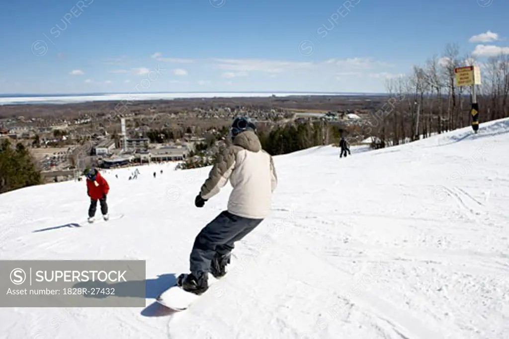 Boy Snowboarding, Blue Mountain, Collingwood, Ontario, Canada   