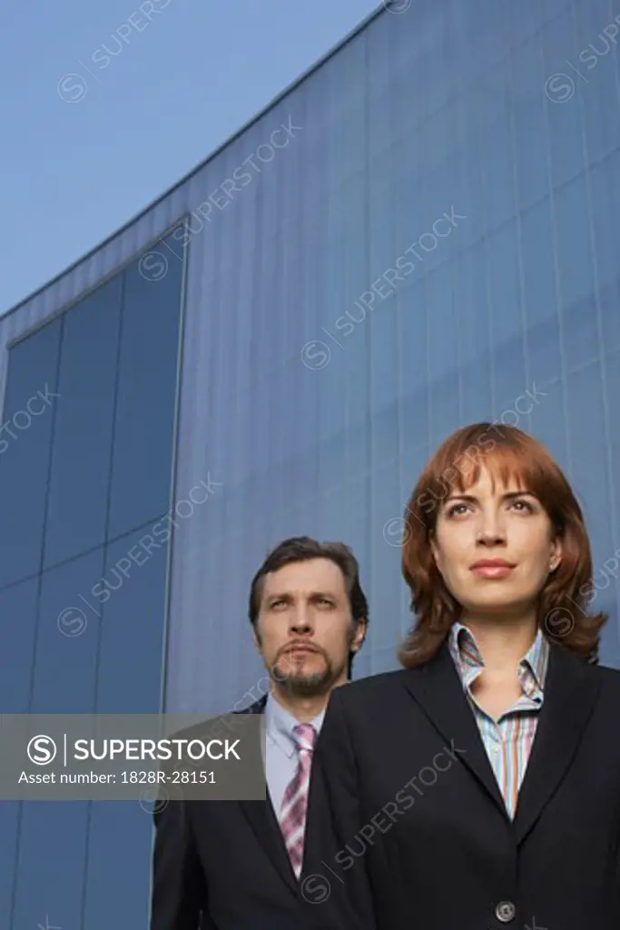 Woman and Man in Front of Building   