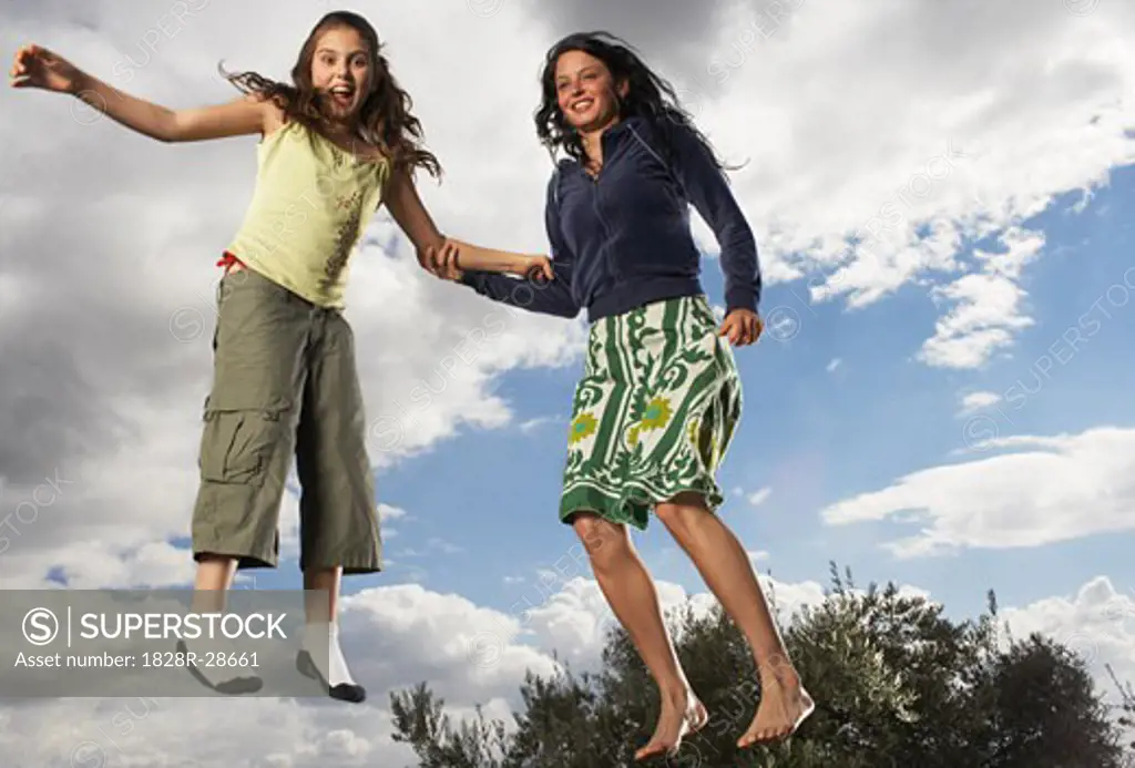 Mother and Daughter Jumping   