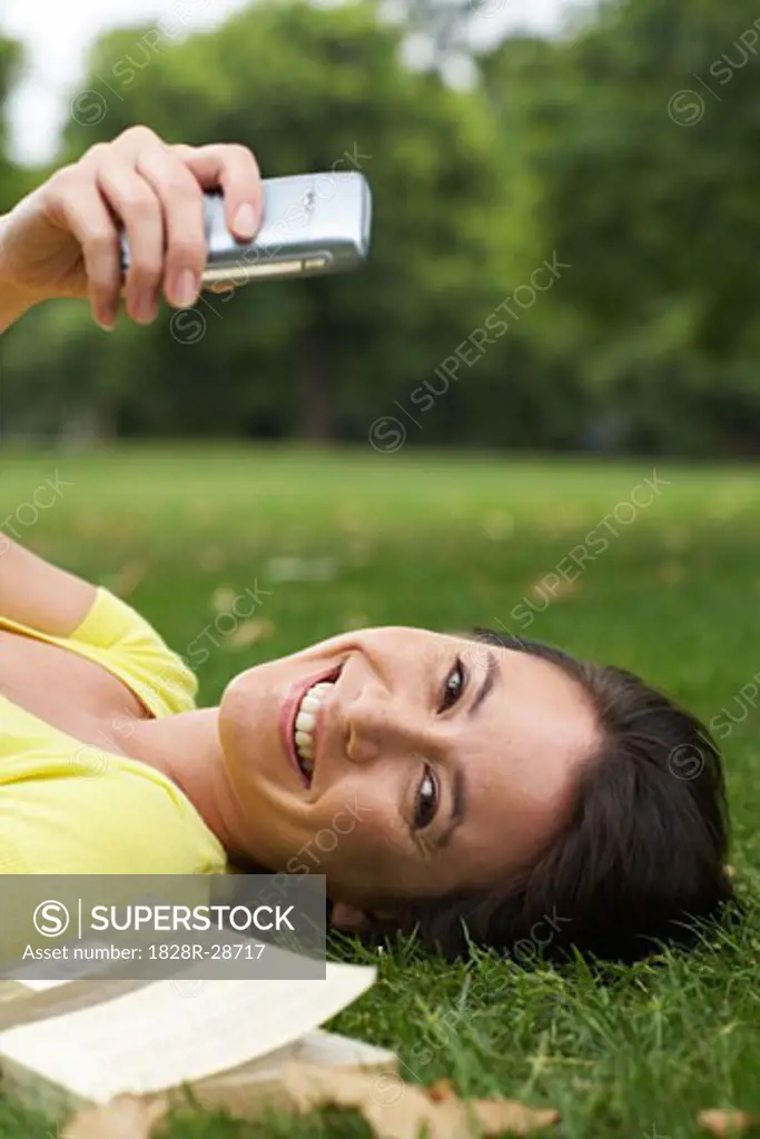 Portrait of Woman Lying in Grass   
