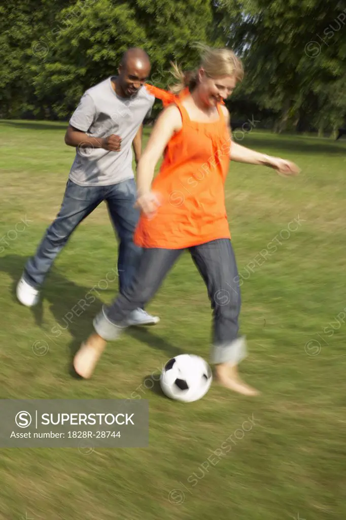 Friends Playing Soccer   