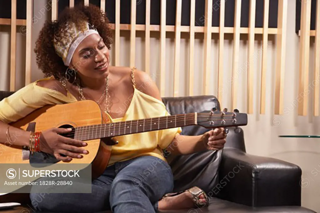 Woman Playing Guitar   