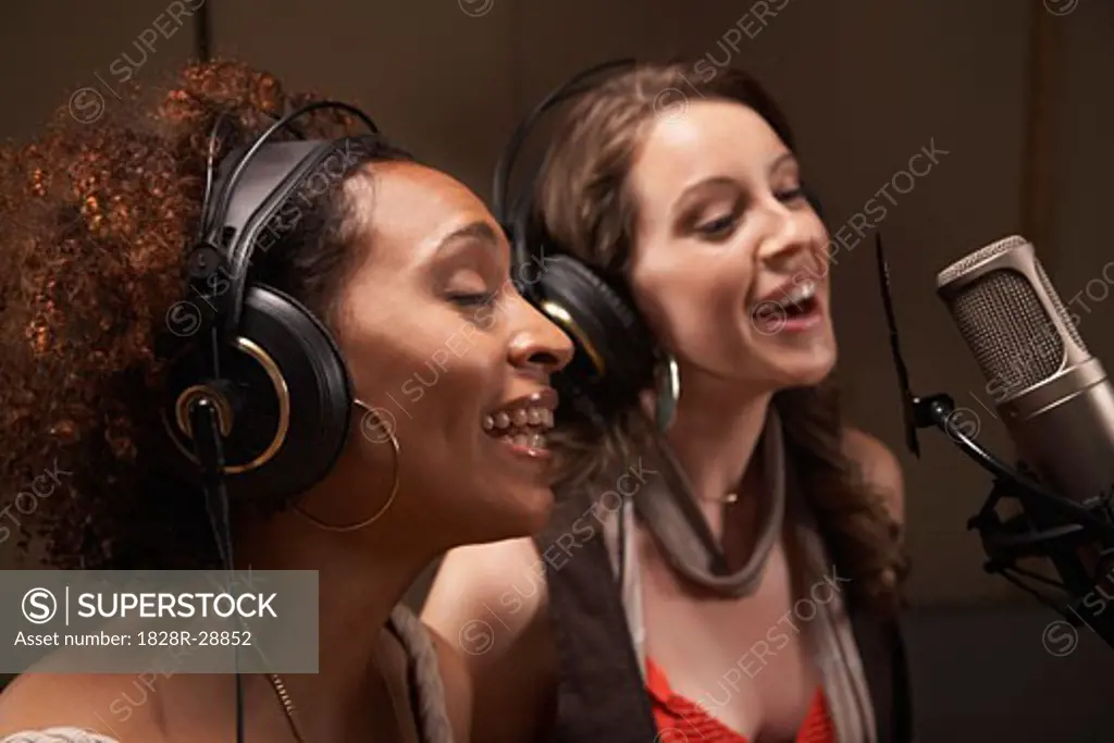 Women Singing in Recording Studio   