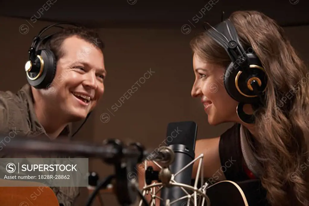 People Singing in Recording Studio   