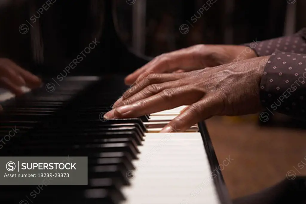 Person Playing Piano   