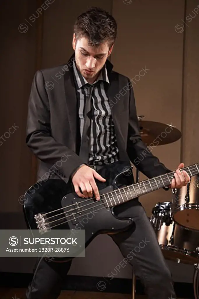 Man Playing Bass Guitar   